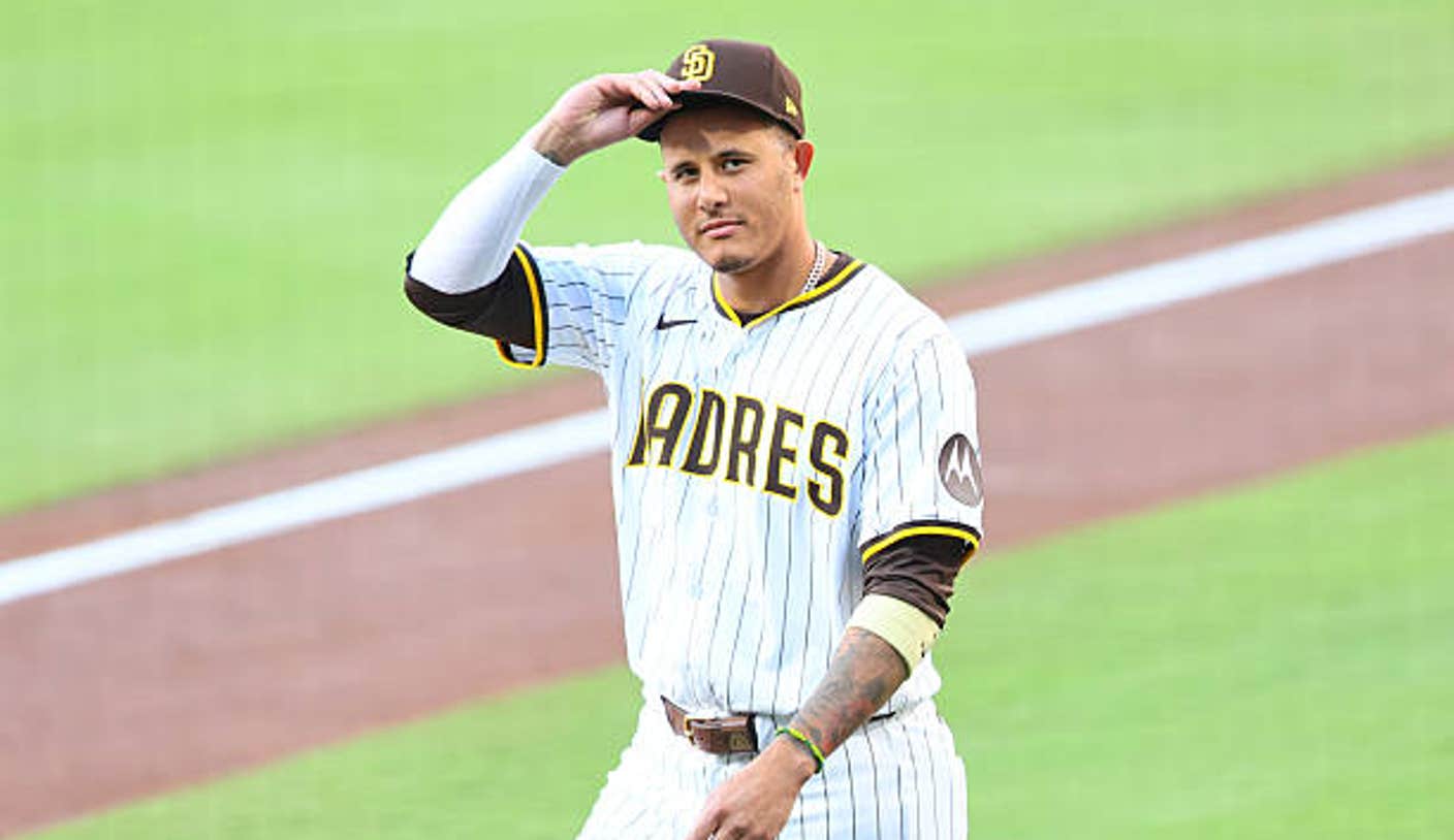 san diego california manny machado of the san diego padres tips his hat as he walks onto the