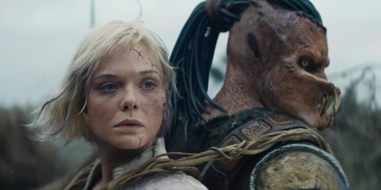 Badlands' Rescues Box Office With Record $80M Opening (L-R) Thia (Elle Fanning) and Dek (Dimitrius Schuster-Koloamatangi) in 20th Century Studios' Predator: Badlands