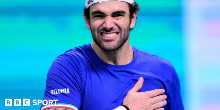 Matteo Berrettini celebrates winning his semi-final match for Italy in the Davis Cup