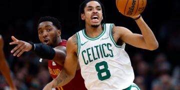 Josh Minott's Celtics got the better of Donovan Mitchell (left) and the Cavaliers on Wednesday night at TD Garden.