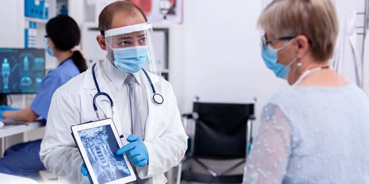 Doctor Explaining Serious Neck Personal Injury Charlotte, NC