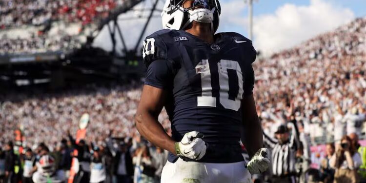 Penn State running back Nicholas Singleton (10) has had a topsy-turvy year in line with what the Nittany Lions as a program have faced.
