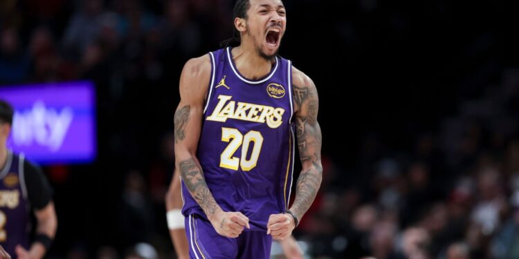 Short-handed Lakers win at Portland with help of Nick Smith Jr. Short-handed Lakers win at Portland with help of Nick Smith Jr.