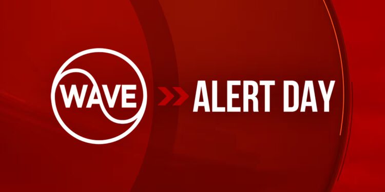 Snow showers end this evening, slick spots possible early Tuesday AM